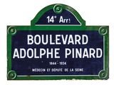 blue and green street sign with the words boulevard adophe pinard on it