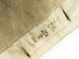 a close up of a hat with a label on it