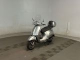 a scooter that is parked inside of a building