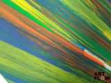 brightly colored paint on a skateboard with the words art flow written on it