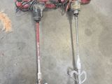 two tools that are laying on the floor