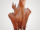 sculpture of a bird on a pedestal on a white background