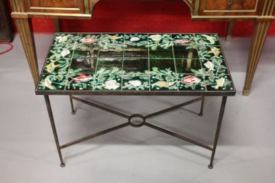 a small table with a mirror on top of it