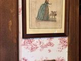deux tableaux encadrés sur le mur d'une pièce