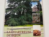 a book with a picture of a large tree in the middle of it