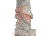 a stone sculpture of a face on a white background