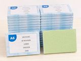 a stack of business cards sitting on a table