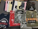 many t - shirts that are on a table together