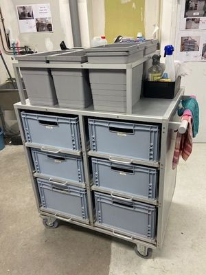 a cart that has many drawers on top of it