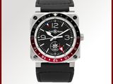 une photo d'une montre noire et rouge sur fond blanc