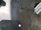 a close up of a sink with a metal faucet in it