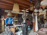 a room filled with lots of antiques and art supplies
