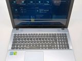 a laptop computer that is sitting on a table