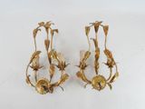 pair of gold plated wall sconces with flowers and leaves