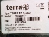 a label on the back of a computer that says terra