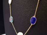 a close up of a necklace on a mannequin mannequin mannequin mannequin mannequin mannequin mannequin mannequin