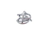 a close up of a silver ring on a white surface