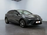 a grey toyota c - hr is parked in a large room