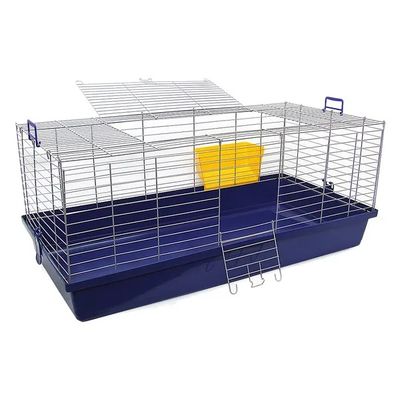 a small cage with a yellow object inside of it