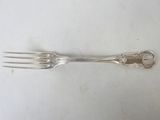 a fork and a spoon sitting on a table