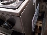 a silver stove top with two burners on it in a store