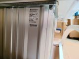 a picture of a refrigerator in a kitchen with a price tag on it