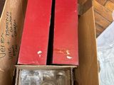 two boxes that have a couple of red boxes in them