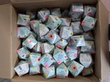 a box full of soaps that are sitting on the floor