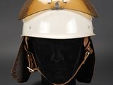 an image of a helmet on a mannequin head on a black surface