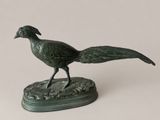 statue of a pheasant on a base on a white background