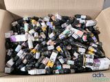 a cardboard box filled with bottles of alcohol