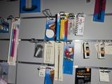 many office supplies hanging on the wall in this room
