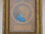 an old picture of a man in a blue dress in a gold frame