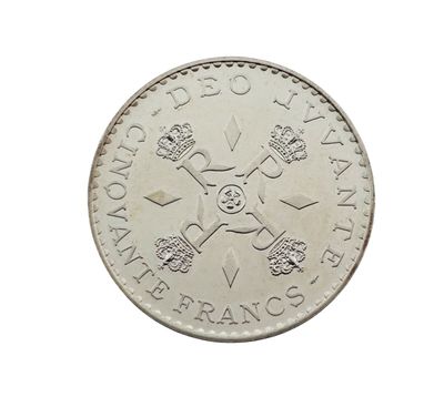 une vieille pièce britannique d'une livre sur laquelle figurent un crâne et des os croisés