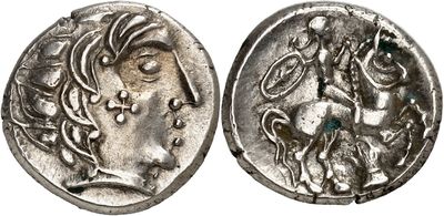 a silver coin with an image of a woman on it