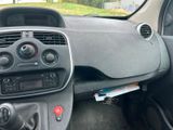 a dashboard of a car with a radio and other items in it