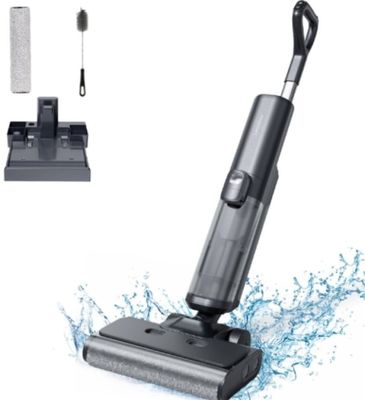 a close up of a vacuum cleaner with a brush on top of it