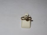 a ring that is sitting on top of a piece of paper