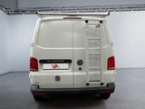 a white van that is parked in a garage