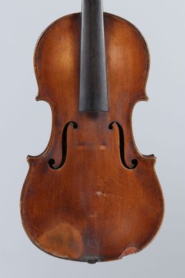 an old violin with a bow on a white background