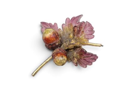 an image of a close up of a flower brooch on a white surface