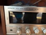 a close up of a silver microwave on a table