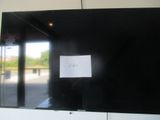 une photo d'une photo d'une photo accrochée au mur