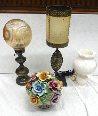 two lamps that are sitting next to each other on a table