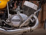 a close up of a motorcycle engine on a street