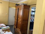 an image of a cluttered room with clutter on the table