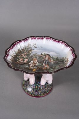 a bowl with a picture of a man and a woman on it