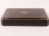 an image of a wooden box with a decorative design on it
