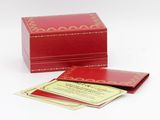 an image of a red box that has some cards in it