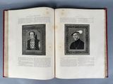 an open book with a picture of two men and a picture of a woman
